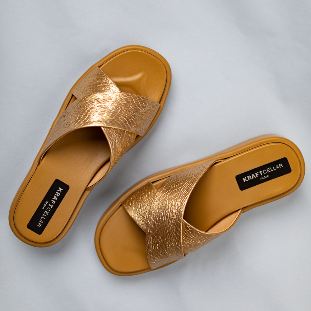 women comfort cross-strapped gold low platform heels of 1.5inch. Perfect to add an instant statement to your outfit.