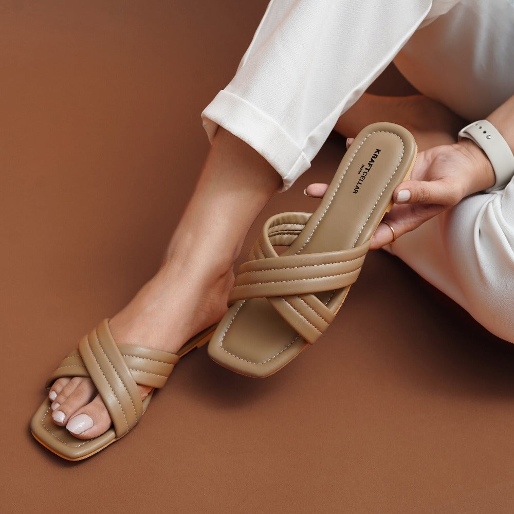 Women comfort cross strapped flats perfect for your weekend gateways. Color beige and pink.