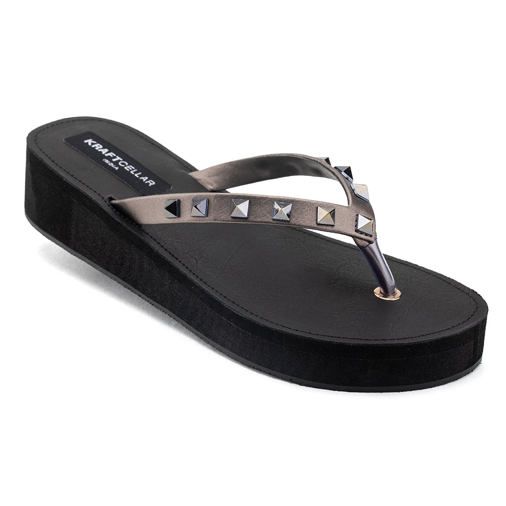 women footwear in low platform comfort heels of 2.5inch, with super stylish gun metal straps. Perfect for casual meet up's.