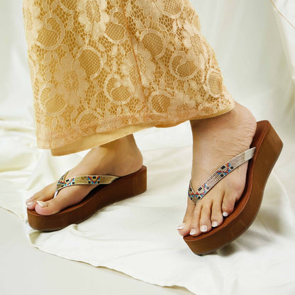 Elegant gold two strapped slip ons of heel 2.5inch. Perfect for everyday errands.