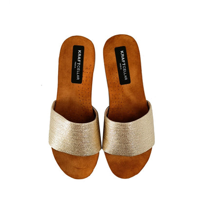 Bling well with these beautiful gold slip ons in platform heels of 2.75inch.